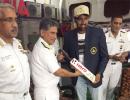 Ashwin enjoys a cup of coffee with naval officials following Vizag win