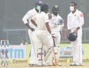 Sri Lanka go behind masks after Kohli's record double