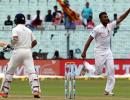 PHOTOS: Pujara, rain thwart Sri Lanka's charge on Day 2