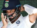 Why does Pujara usually not respond to criticism