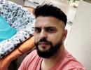 Suresh Raina gets a haircut from wife Priyanka