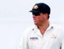 Warne's baggy green raises A$1m for bushfire victims