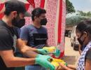 Shami distributes food and water to migrants