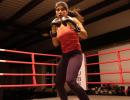 Boxer Zareen stuns world champ to enter quarters