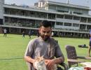 PICS: Kohli meets a cool cat during net practice