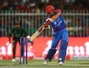 PICS: Afghanistan tame B'desh, enter Super 4s