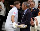 Heartwarming! Root hugs father after historic century