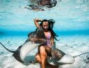 This model loves to cuddle deadly stingrays