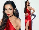 Oomphalicious! Malaika stuns in a figure-hugging gown