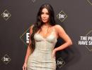 Hot alert! Kim sizzles in a figure-hugging gown