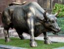 Sensex ends down 220 points at 16,877