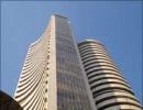 Sensex ends up 61 points at 18,824