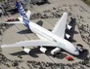 Airbus to cut output, foresees tough times