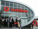 Holland seeks compromise over Vodafone tax