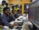 Markets end flat amid range bound trades