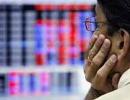 Markets end flat on global cues