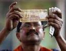 Re fails to maintain initial gains, down 16 paise vs dollar