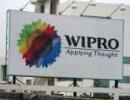 Wipro promoters to cut stake via auction