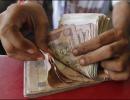 Rupee up 61 paise, ends at 2-wk high