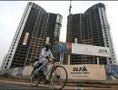 DLF shares sink 9% on court order