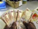 Rupee ends 7 paise down vs. dollar at 54.21