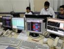 Markets edge higher; RBI policy key