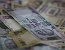 Rupee at two-week low, slumps 35 paise