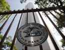 Weak rupee, high inflation force RBI to hold rates