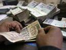 India in tight spot as rupee slides to record low