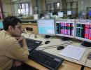 Sensex ends below 21,100 mark; Q3 nos disappoint