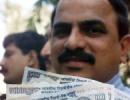 Rupee at over 2-week high, at 61.23 against dollar