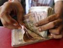 Rupee snaps two-day fall as exporters, corporates sell dollars