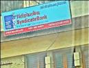 Syndicate Bank brass in damage control