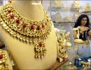 Gold, silver fall on global cues, low demand