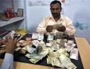 Rupee rises 8 paise to 62.15 Vs dollar in late morning trade