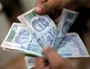 Rupee rises most in 7 weeks, ends at 59.69 on budget hopes