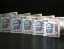 Rupee rises 15 paise to end at over 1-week high