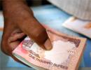 Rupee ends marginally higher; importer demand limits gains