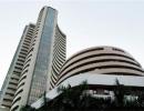 Markets end at record closing highs; Nifty closes above 7,700