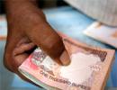 Rupee up 6 paise against dollar in early trade