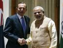 Modi and Abbott target free trade pact, sign 5 deals