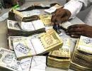 Rupee ends almost flat on Asian cues