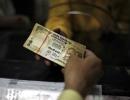 Rupee rises after 2 sessions; ends 15 paise higher against dollar