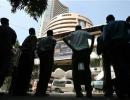 RBI policy fails to cheer markets; Sensex ends flat