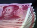 Yuan devaluation to hit firms with foreign loan exposure