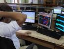 Sensex trims losses; bluechips climb higher