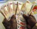 Rupee falls 11 paise to 66.44 vs US dollar