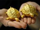 Gold, silver extend losses on low demand, global cues