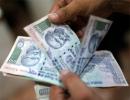 Rupee falls to 4-week low at 64.08