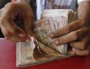 Rupee weakens further, down 9 paise to 66.67